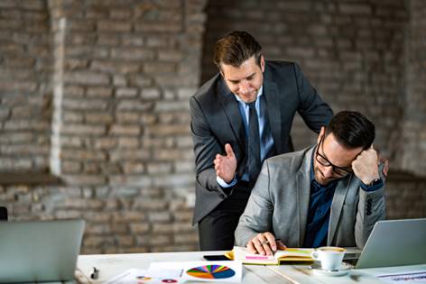 Man pitying coworker - Wrongful Termination